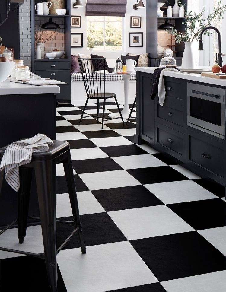 checkered luxury vinyl tile flooring in a stylish kitchen
