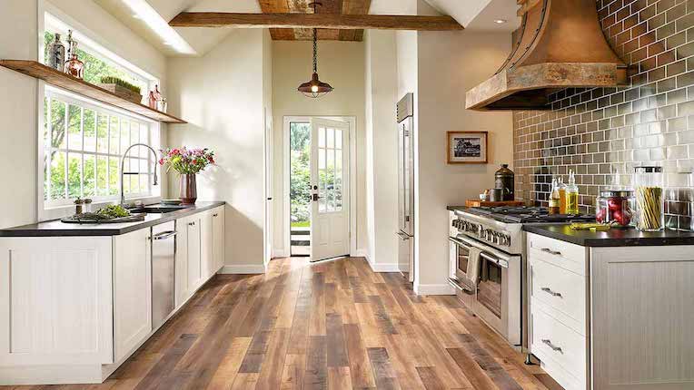 wood look laminate flooring in a gorgeous rustic kitchen